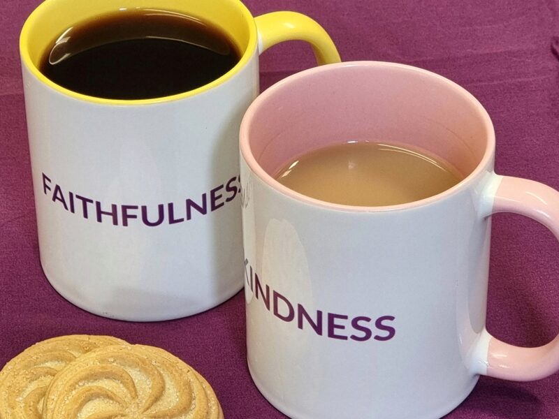 Two mugs, with the words Faithfulness and Kindness written on them